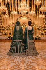 Deep green bridal ensemble with gold work · Back view