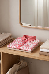 Pink Abstract-Print Silk Suit · Pink · folded shirt