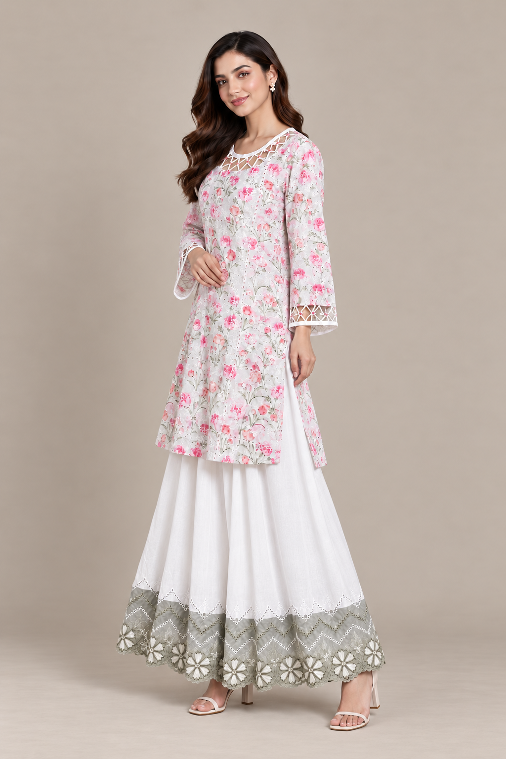 Pink floral embroidered lawn shirt and white embroidered trousers, front view